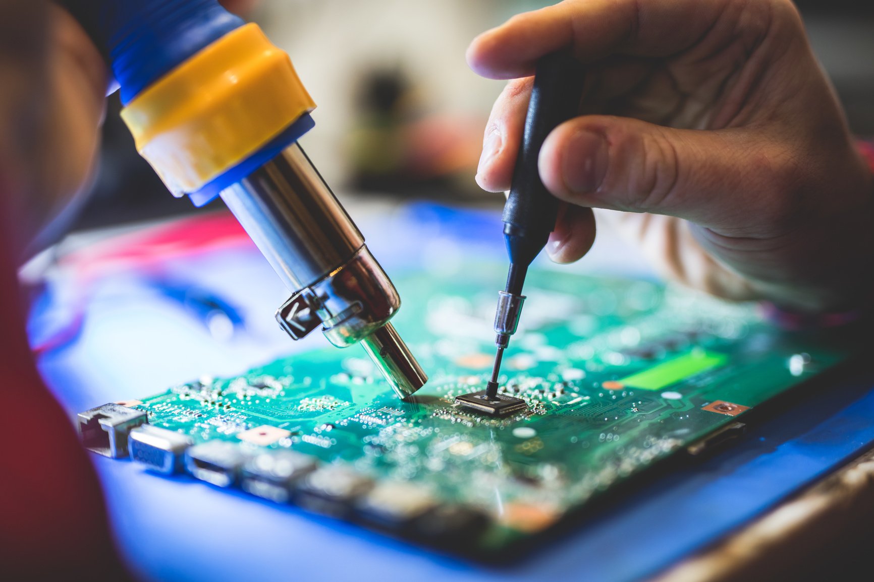 Man repairing PC main board