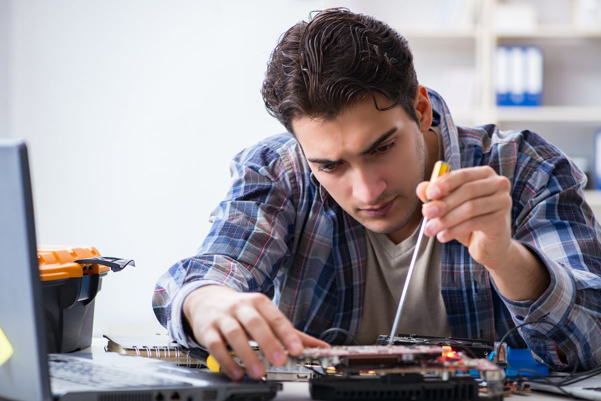 Technician Repairing Hardware